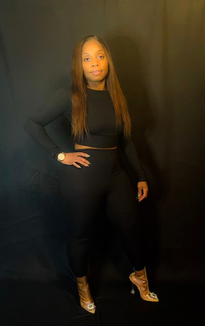 Get ready to stand out! Black Stallion's two piece pants set will ensure you make an entrance with its statement open-back, low-bow top, and comfy yet stylish black pants